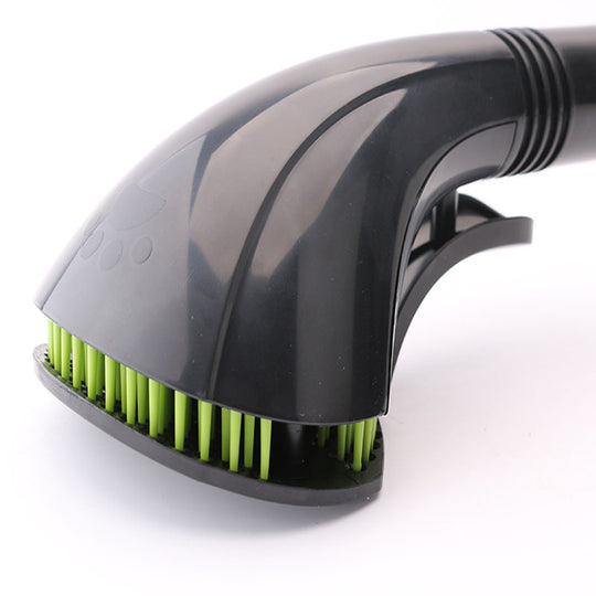 Black pet grooming brush with green bristles for dog or cat fur care