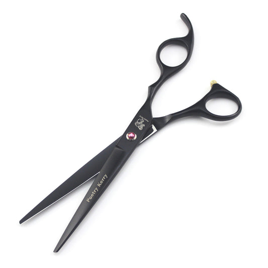 Black pet grooming scissors with ergonomic handles and pink gem, ideal for precise dog or cat hair trimming.